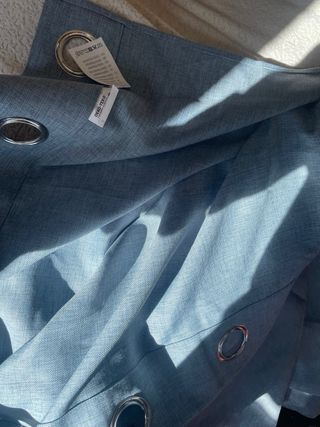 Cortinas azules con ojales