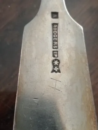 Cucharón antiguo plateado