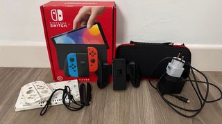 Nintendo Switch OLED + Juegos