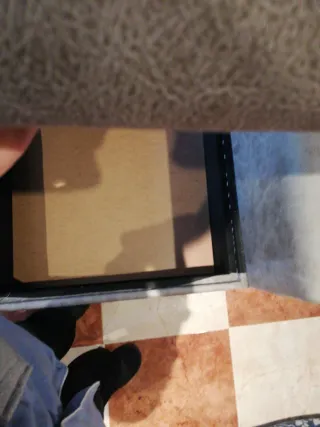 Divano grigio in tessuto modulare con chaise longue