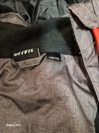 Abrigo infantil niño gris y negro