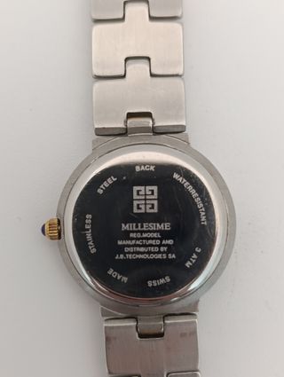 Reloj Givenchy Millesime Oro y Plata