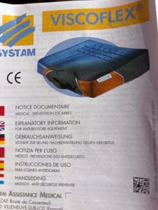 Cuscino antidecubito grigio e arancione