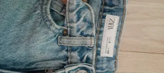 Pantalón corto vaquero desgastado