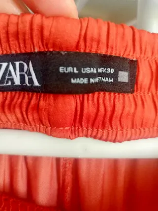 Pantalón ancho fluido satén terracota,