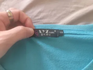 Sudadera azul de gatito