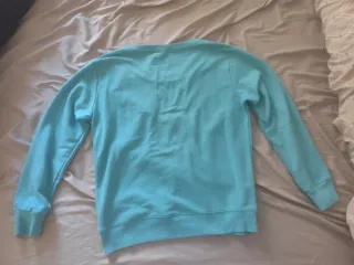 Sudadera azul de gatito