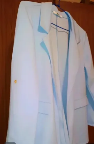 Blazer azul claro con colgante nuevo. Combo fiesta