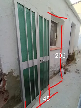 Puerta doble de aluminio con cristal