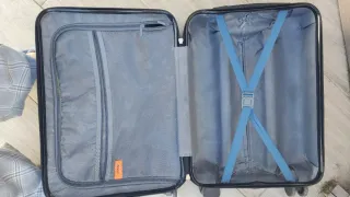 Maleta pequeña azul con dibujo de moto