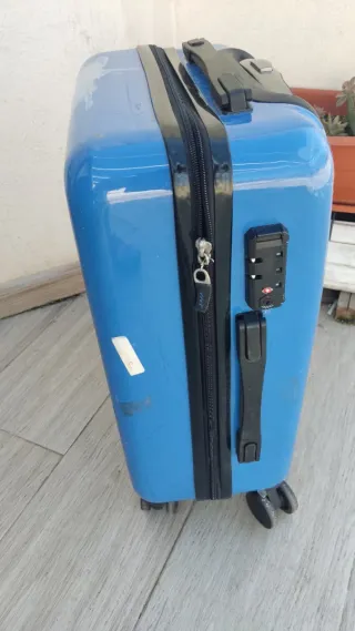 Maleta pequeña azul con dibujo de moto