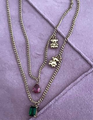 Collar dorado con colgantes de osito acero
