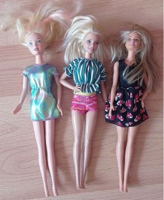 Lote de Barbies y Ken con Ropa
