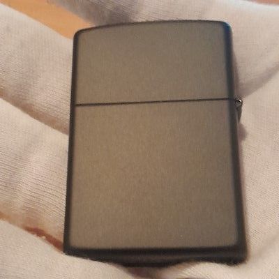 Zippo Faccia a Faccia