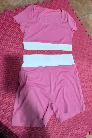 Mono corto negro con cremallera tallas S y M