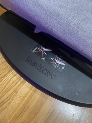 Hamaca Babybjörn gris con barra de juegos