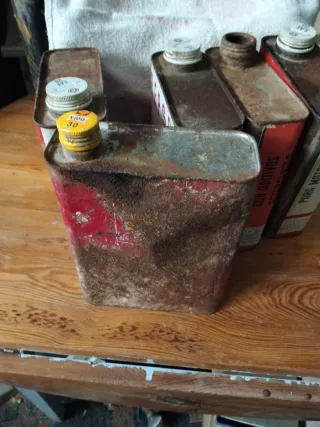 Bottiglie antiche di olio Repsol