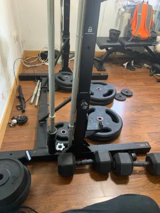 Rack de pesas y discos negociables