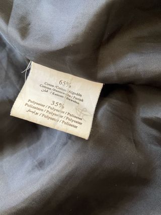 Plumas negro con capucha y pelo