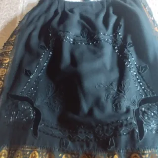 Trajes de Piñorra negro y dorado