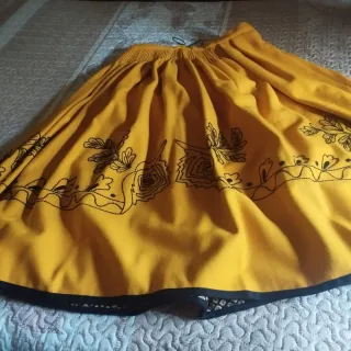 Trajes de Piñorra negro y dorado