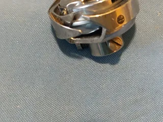 Garfio giratorio para máquina de coser