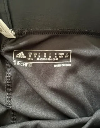 Mallas deportivas Adidas negras con bolsillo