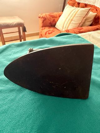 Plancha antigua de hierro fundido