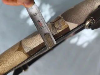 Bolso Tous estampado beige y marrón