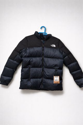 Plumífero The North Face con etiqueta