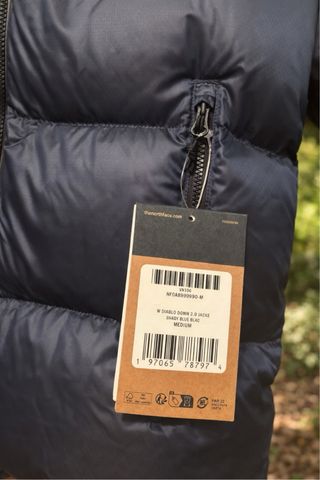 Plumífero The North Face con etiqueta