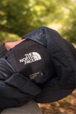 Plumífero The North Face con etiqueta