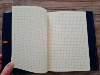 Taccuino a quadretti. Sovracopertina blu. Nuovo