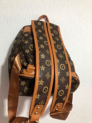 Bolso de mujer marrón y dorado