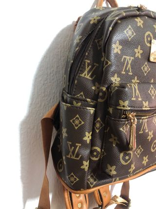 Bolso de mujer marrón y dorado