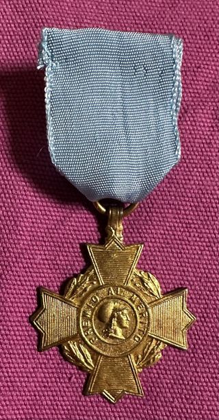 Vieja medalla escolar Premio al Mérito, Minerva.