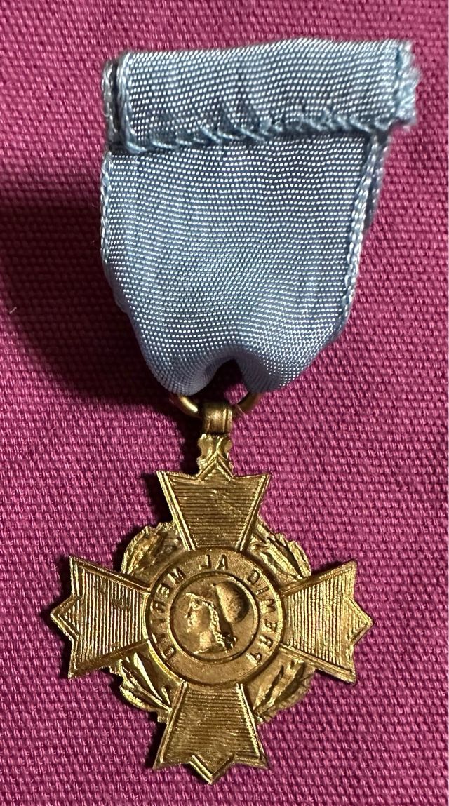 Vieja medalla escolar Premio al Mérito, Minerva.