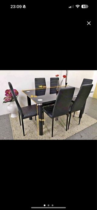 Tavolo da pranzo in vetro e metallo nero