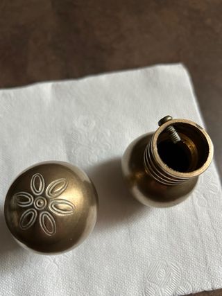 Pomelli per tende in metallo dorato