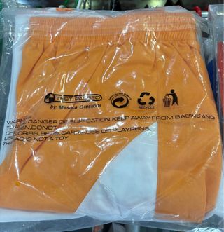 Equipación deportiva MESUCA naranja y blanco