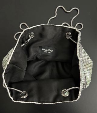 Bolso saca metalizado plateado