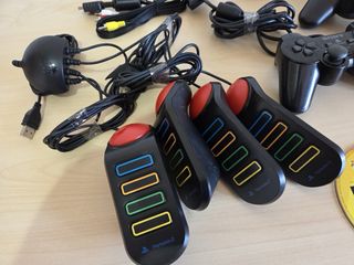 PS2 + BUZZ! + Singstar + Mandos + juegos + mochila