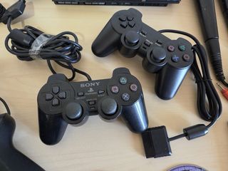 PS2 + BUZZ! + Singstar + Mandos + juegos + mochila