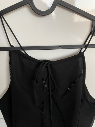 Top negro con lentejuelas