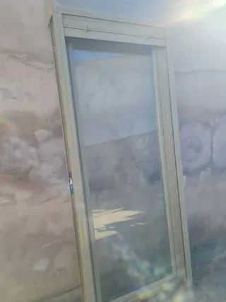 Puerta de aluminio con cristal