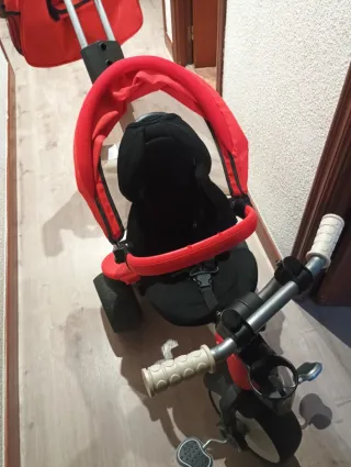 Triciclo infantil rojo