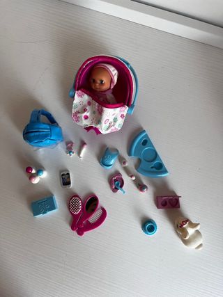 Nancy con cochecito y bebé