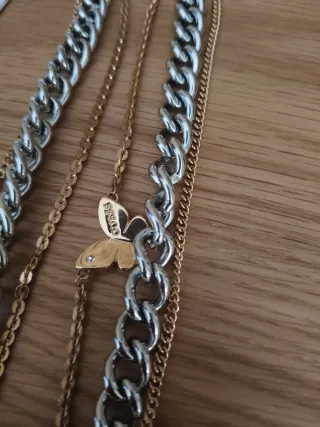 Colgante Guess Mariposa triple Cadena