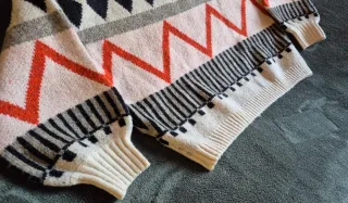 Jersey lana geométrico crop cuello alto talla M