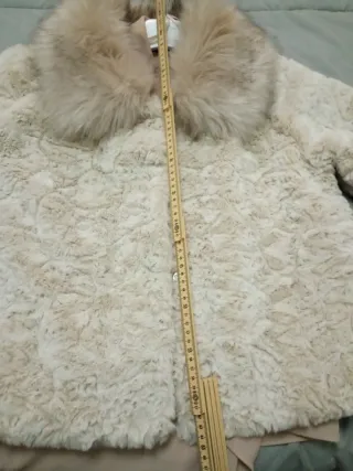 Pellicciotto beige con collo in pelliccia